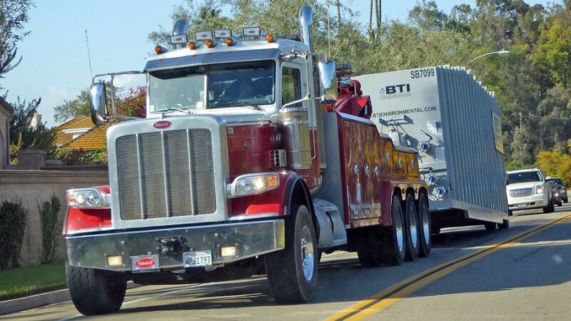 Large Peterbilt Tractor Towing Industrial Equipment in Oklahoma City OK
